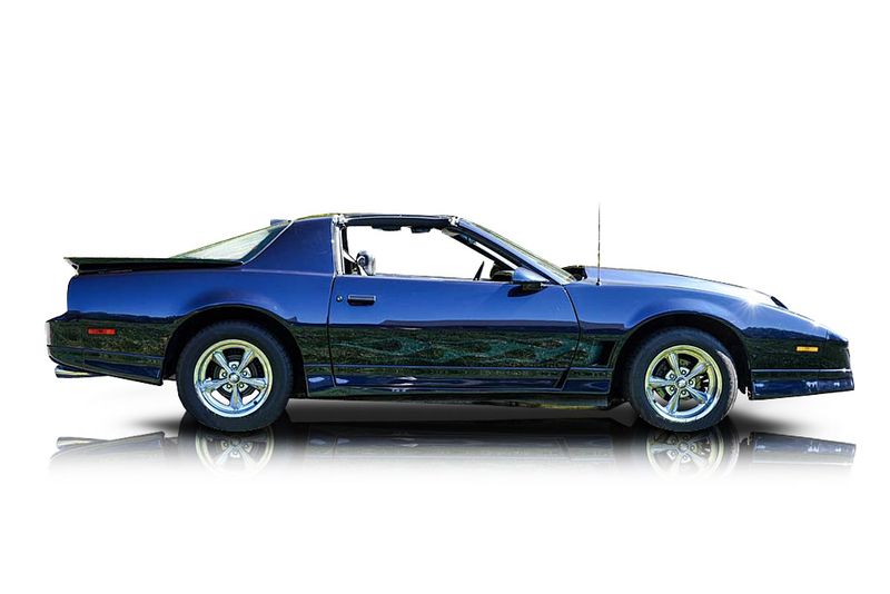 An incredible side shot photo of aPontiac Firebird that you should buy.