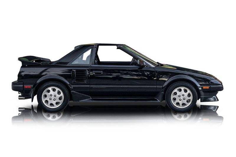 An incredible side shot photo of aToyota MR2 that you should buy.