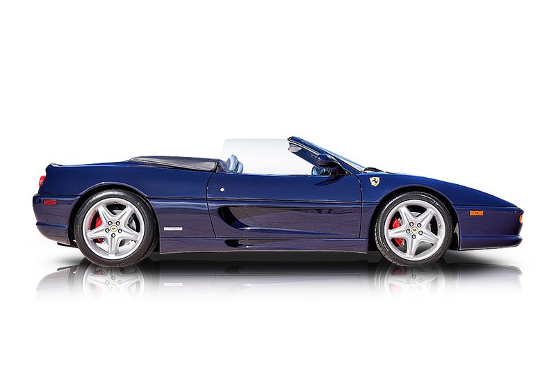An incredible side shot photo of aFerrari F355 Spider that you should buy.