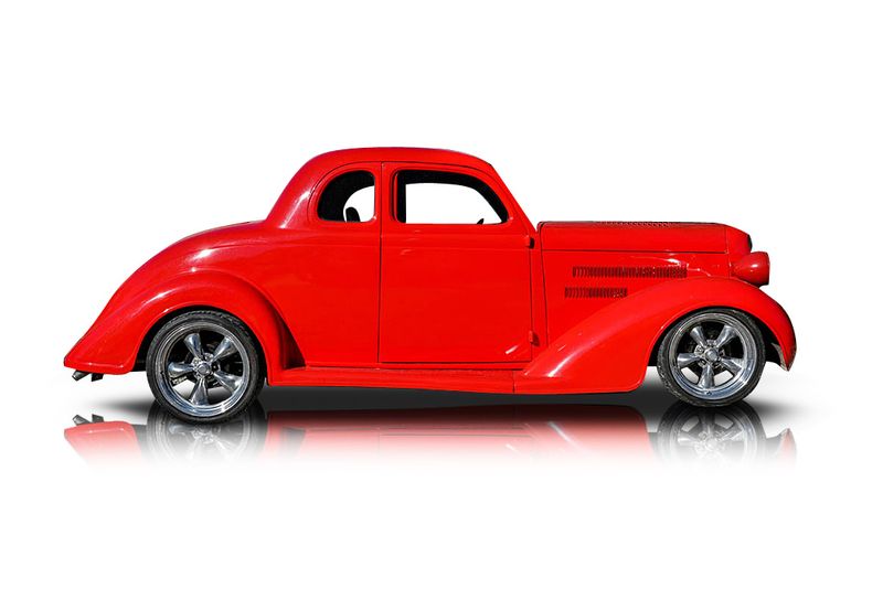 An incredible side shot photo of aPlymouth Coupe that you should buy.
