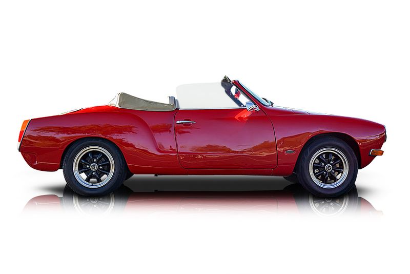 An incredible side shot photo of aVolkswagen Karmann Ghia that you should buy.