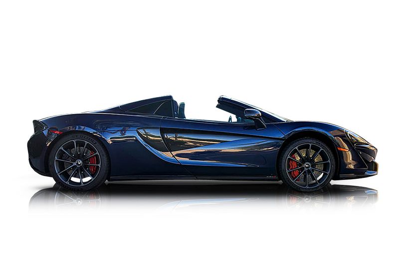 An incredible side shot photo of aMcLaren 570S that you should buy.