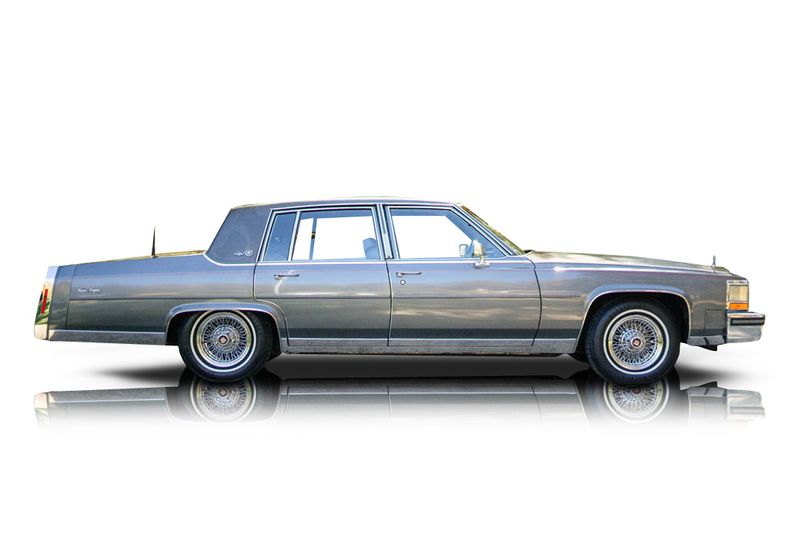An incredible side shot photo of aCadillac Brougham that you should buy.