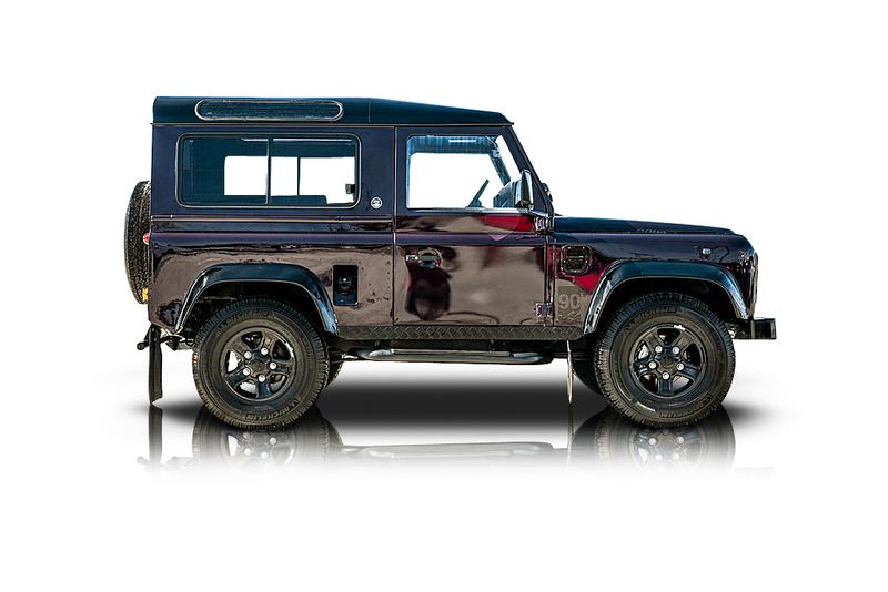 An incredible side shot photo of aLand Rover Defender 90 that you should buy.