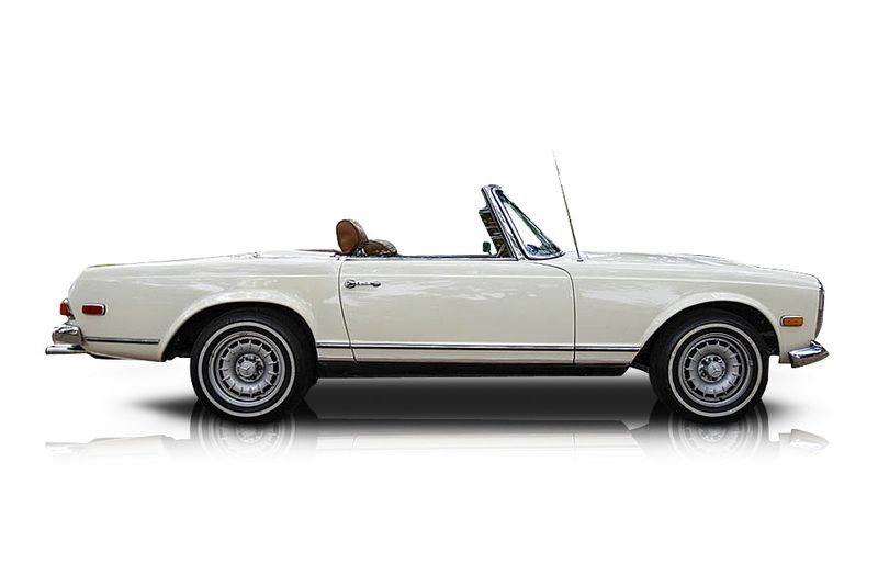 An incredible side shot photo of aMercedes-Benz 280SL that you should buy.