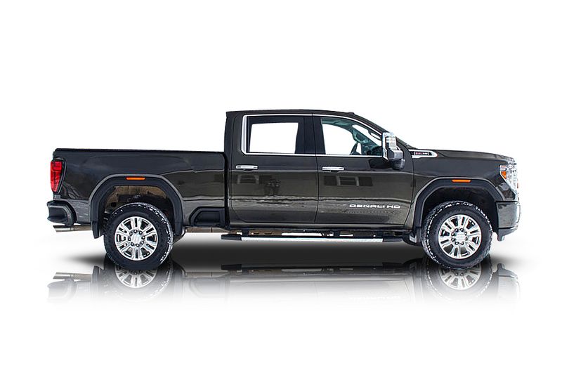 An incredible side shot photo of aGMC Sierra 2500 that you should buy.