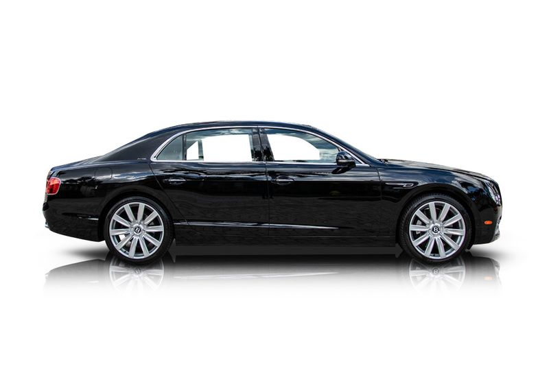 An incredible side shot photo of aBentley Continental that you should buy.