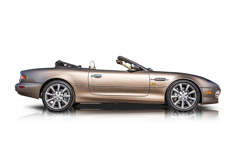An incredible side shot photo of aAston Martin DB7 that you should buy.
