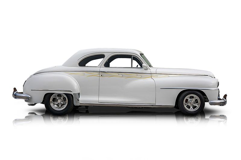 An incredible side shot photo of aDeSoto Deluxe that you should buy.