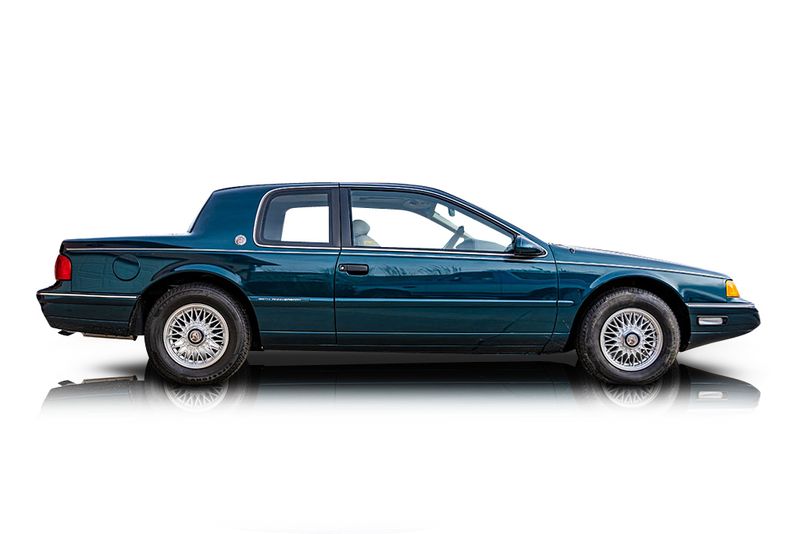 An incredible side shot photo of aMercury Cougar that you should buy.