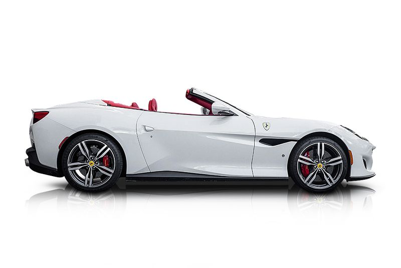 An incredible side shot photo of aFerrari Portofino that you should buy.