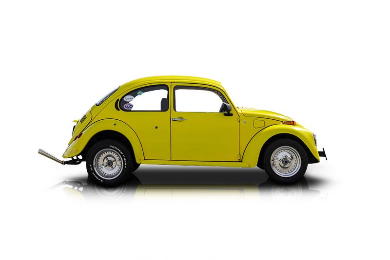 An incredible side shot photo of aVolkswagen Beetle that you should buy.
