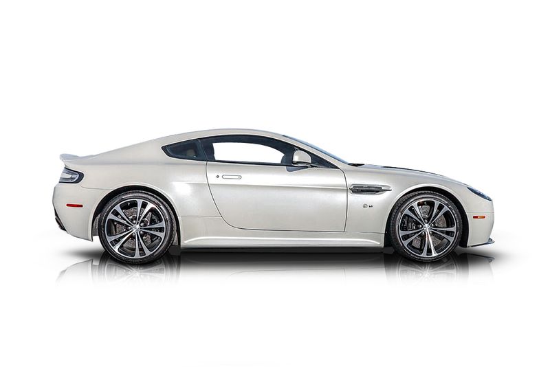 An incredible side shot photo of aAston Martin V12 Vantage that you should buy.