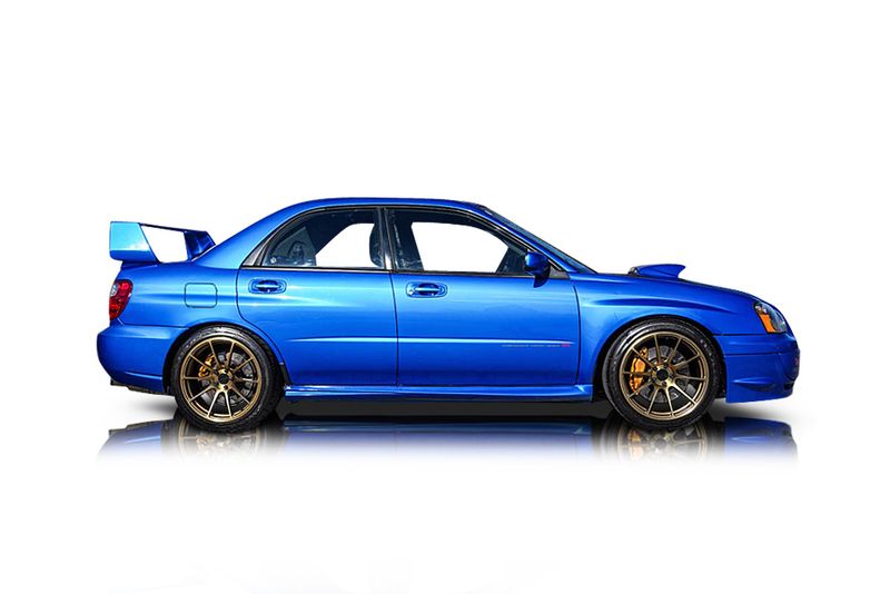 An incredible side shot photo of aSubaru Impreza that you should buy.