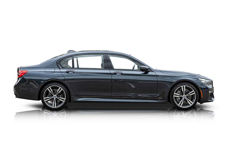 An incredible side shot photo of aBMW 740i that you should buy.
