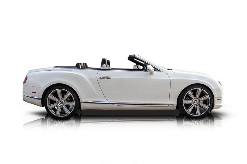 An incredible side shot photo of aBentley Continental that you should buy.