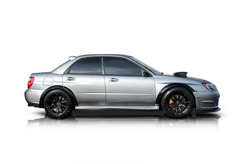 An incredible side shot photo of aSubaru Impreza that you should buy.