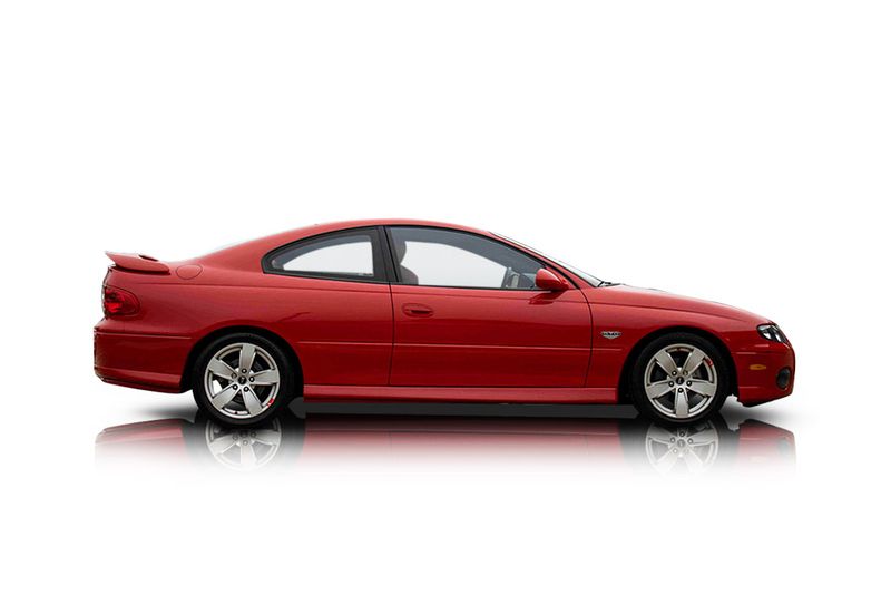 An incredible side shot photo of aPontiac GTO that you should buy.