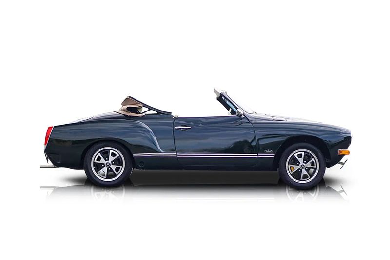 An incredible side shot photo of aVolkswagen Karmann Ghia that you should buy.
