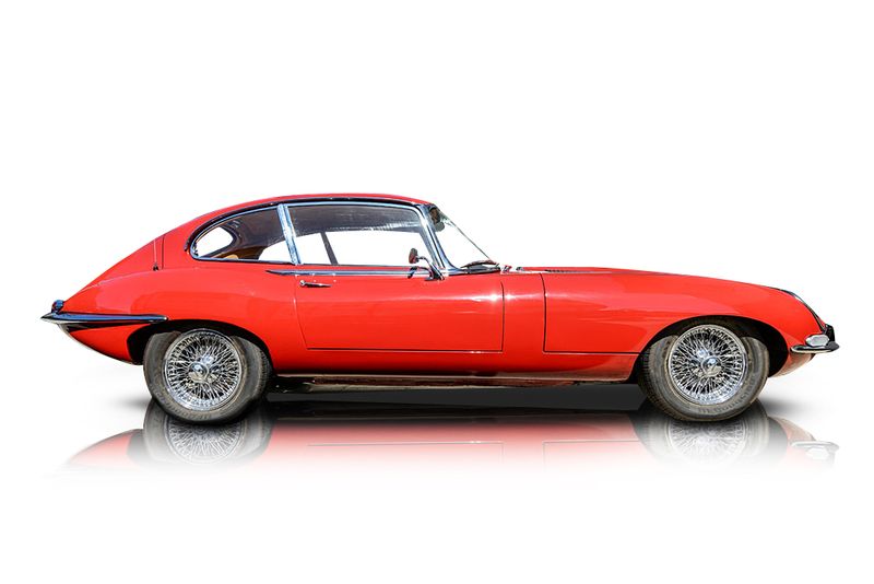 An incredible side shot photo of aJaguar E-Type that you should buy.