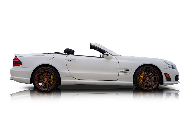 An incredible side shot photo of aMercedes-Benz SL63 AMG that you should buy.