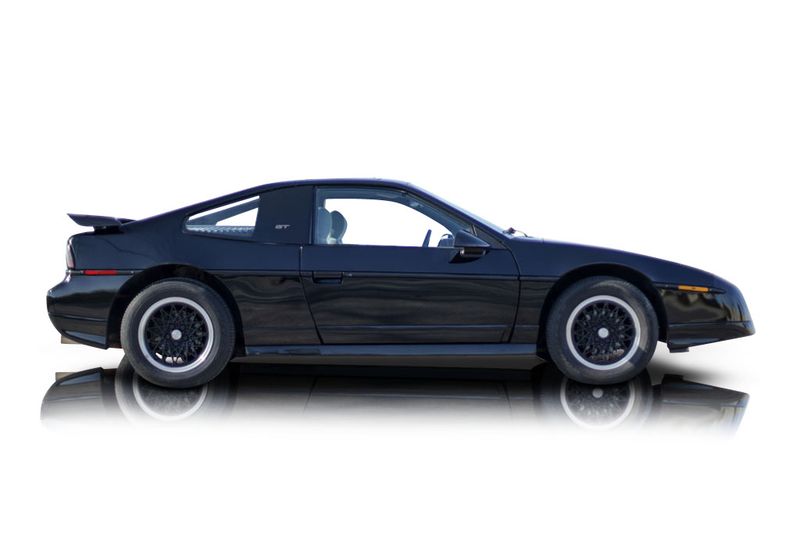 An incredible side shot photo of aPontiac Fiero that you should buy.