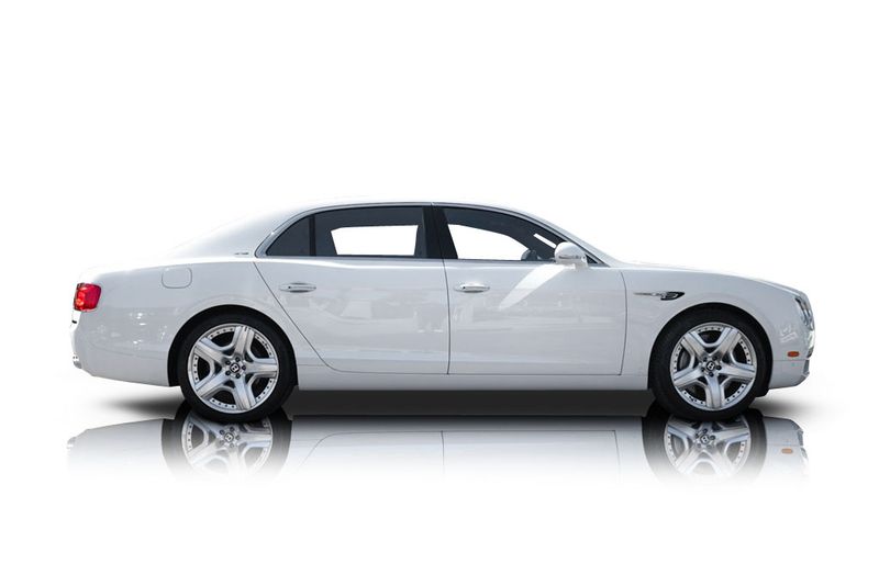 An incredible side shot photo of aBentley Continental that you should buy.