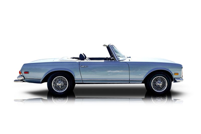 An incredible side shot photo of aMercedes-Benz 280SL that you should buy.