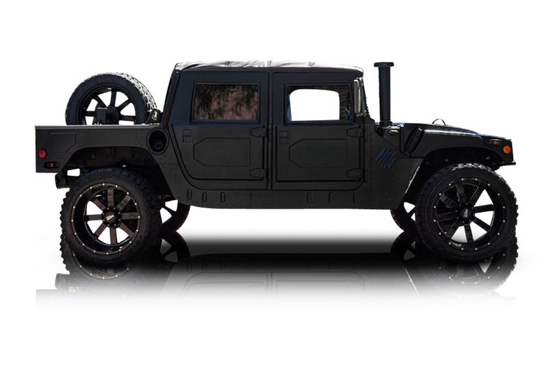 An incredible side shot photo of aAM General Hummer that you should buy.