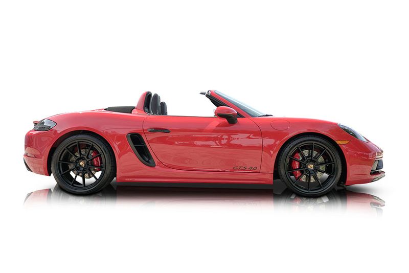 An incredible side shot photo of aPorsche 718 Boxster that you should buy.