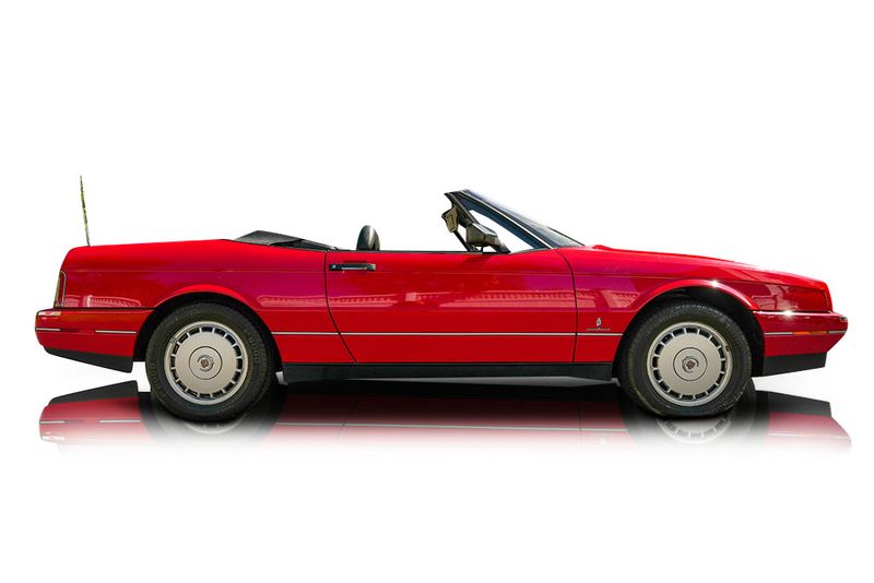 An incredible side shot photo of aCadillac Allante that you should buy.