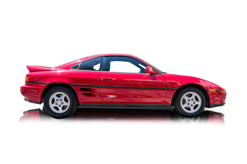 An incredible side shot photo of aToyota MR2 that you should buy.