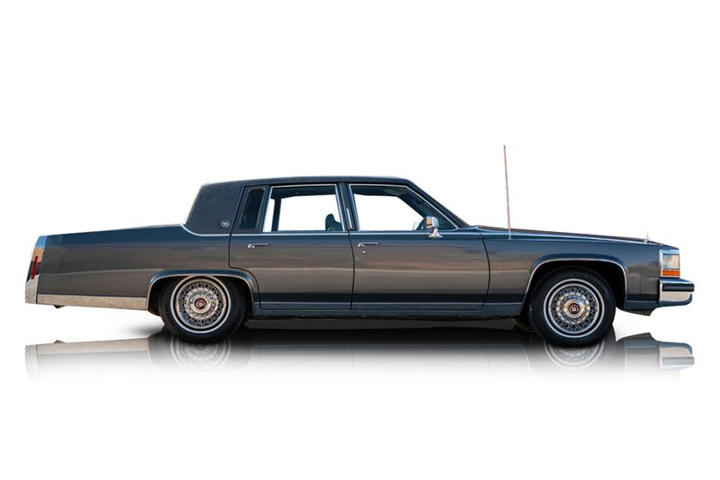 An incredible side shot photo of aCadillac Brougham that you should buy.