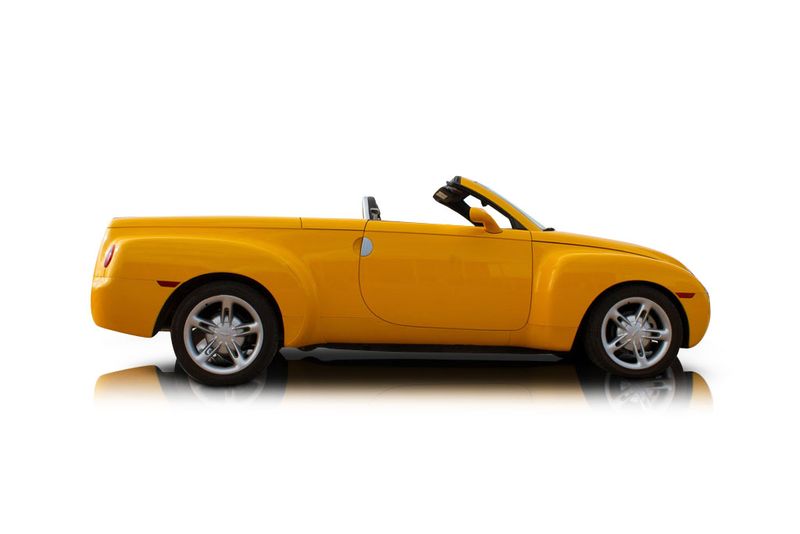 An incredible side shot photo of aChevrolet SSR that you should buy.