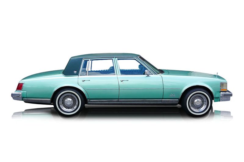 An incredible side shot photo of aCadillac Seville that you should buy.