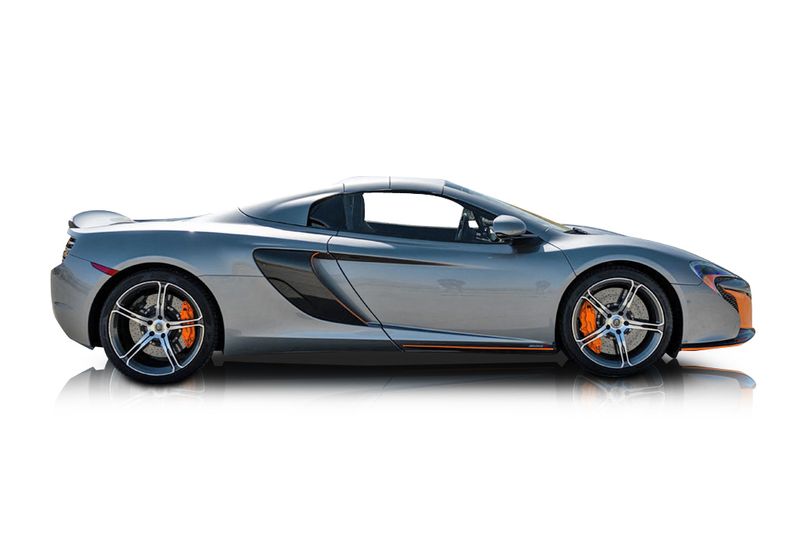 An incredible side shot photo of aMcLaren 650S that you should buy.