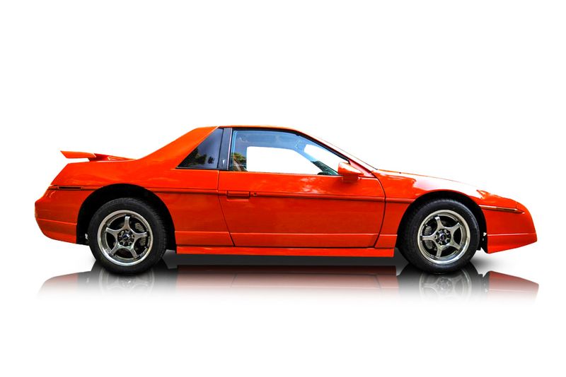An incredible side shot photo of aPontiac Fiero that you should buy.