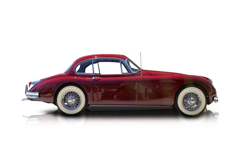 An incredible side shot photo of aJaguar XK150 that you should buy.