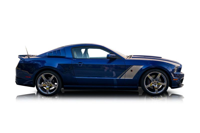 An incredible side shot photo of a car that you should buy.
