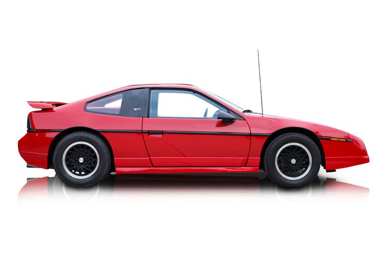 An incredible side shot photo of aPontiac Fiero that you should buy.