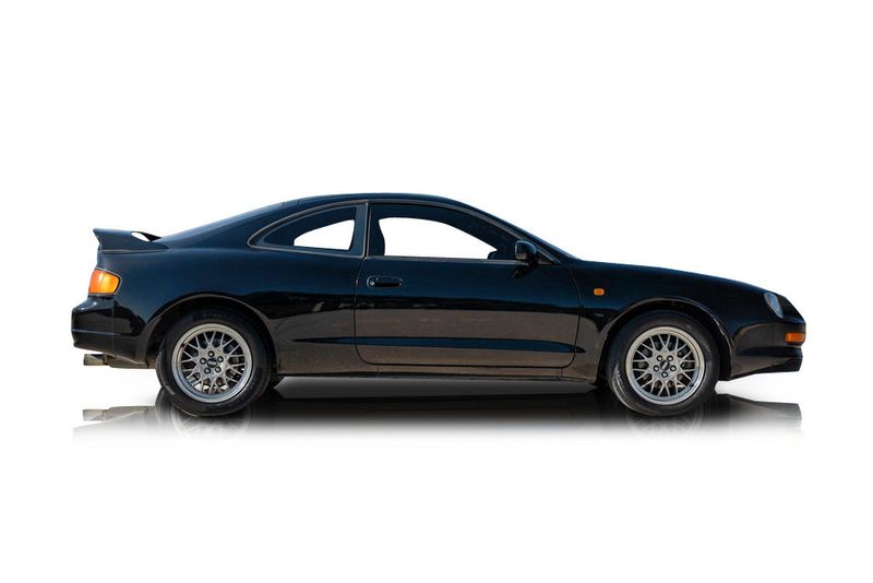 An incredible side shot photo of aToyota Celica that you should buy.