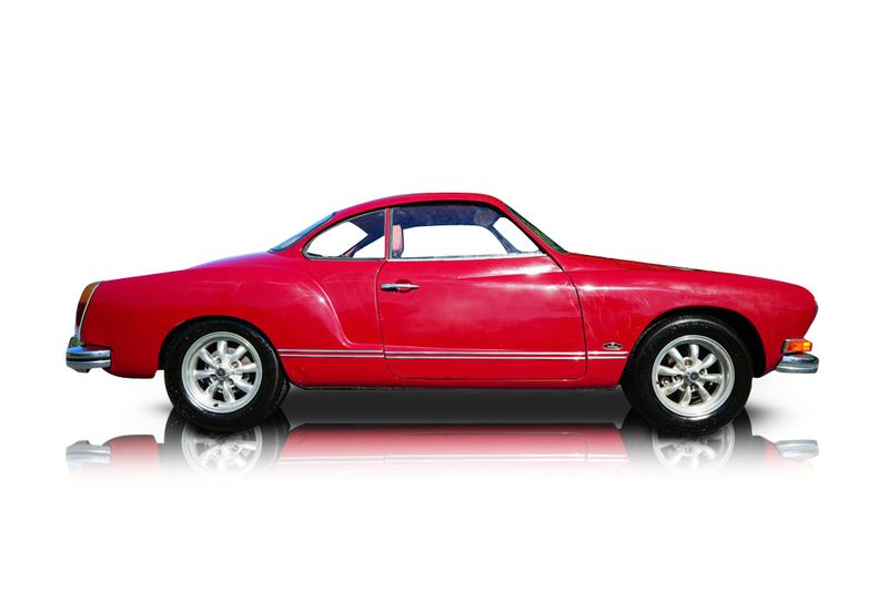 An incredible side shot photo of aVolkswagen Karmann Ghia that you should buy.