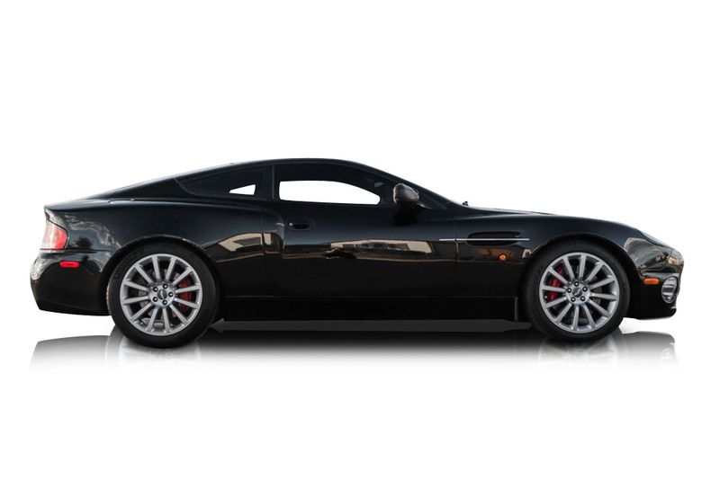 An incredible side shot photo of aAston Martin Vanquish that you should buy.