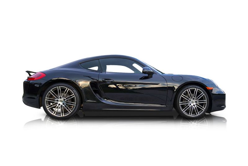 An incredible side shot photo of aPorsche Cayman that you should buy.