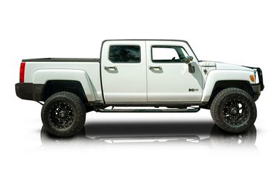 Passenger side photo of 2009 Hummer H3