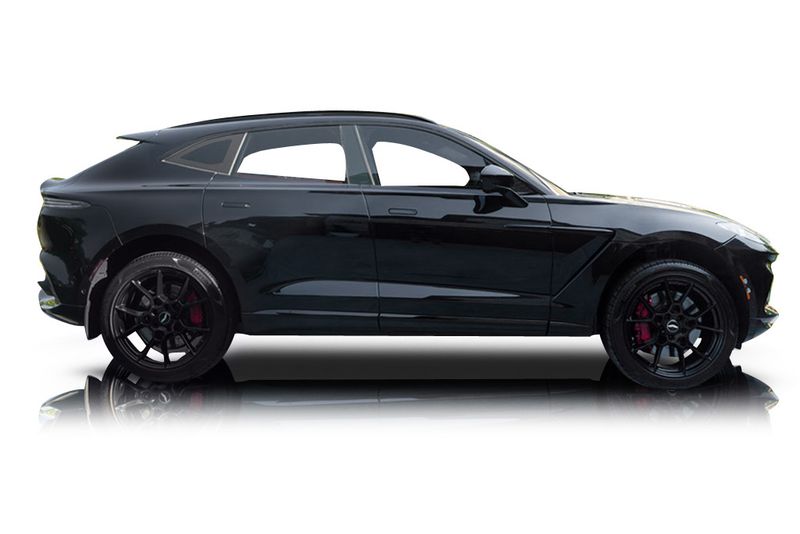 An incredible side shot photo of aAston Martin DBX that you should buy.
