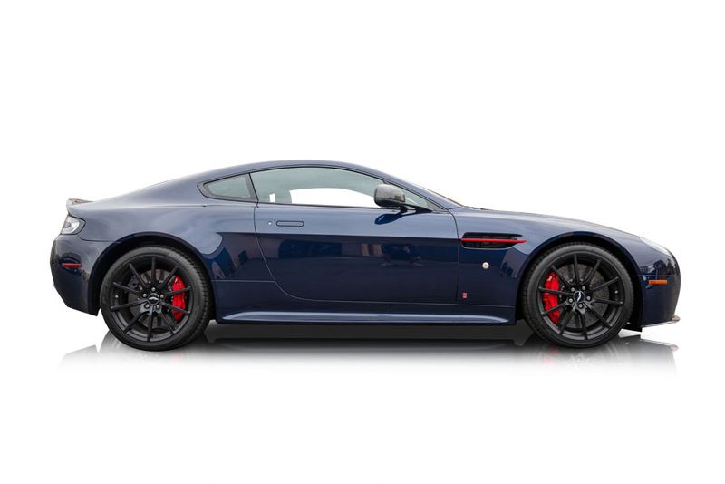 An incredible side shot photo of aAston Martin V12 Vantage that you should buy.
