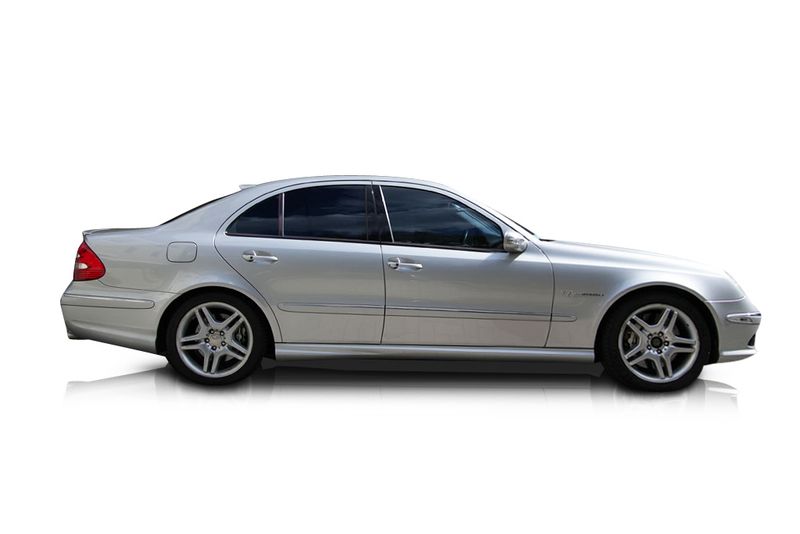 An incredible side shot photo of aMercedes-Benz E55 AMG that you should buy.