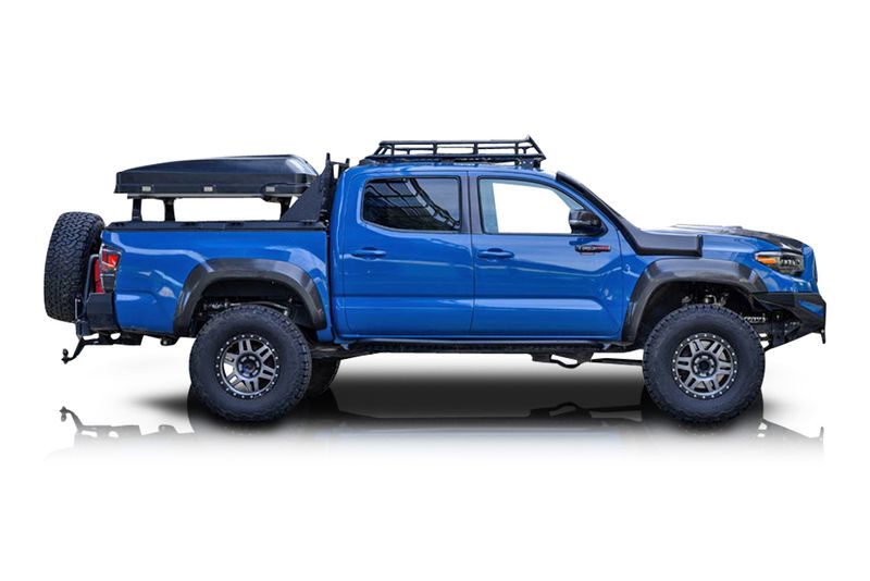 An incredible side shot photo of aToyota Tacoma that you should buy.