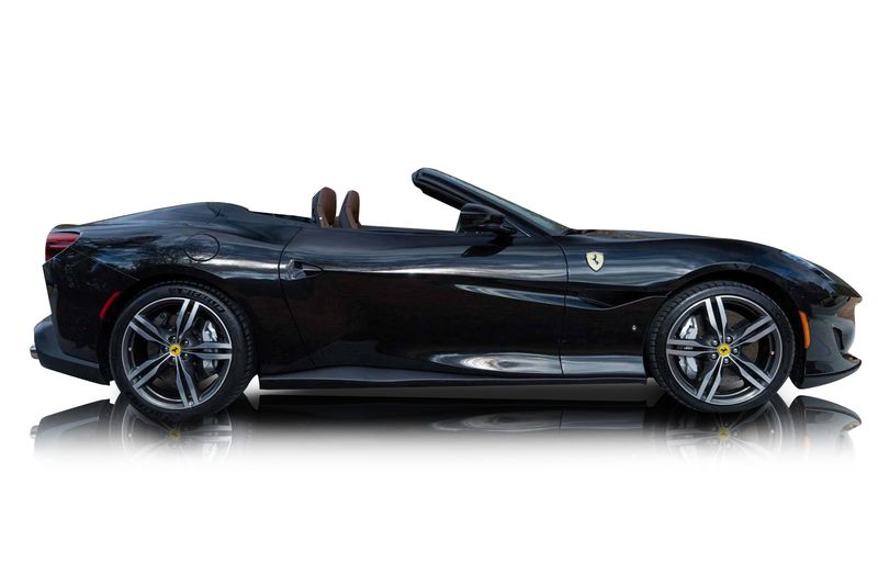 An incredible side shot photo of aFerrari Portofino that you should buy.